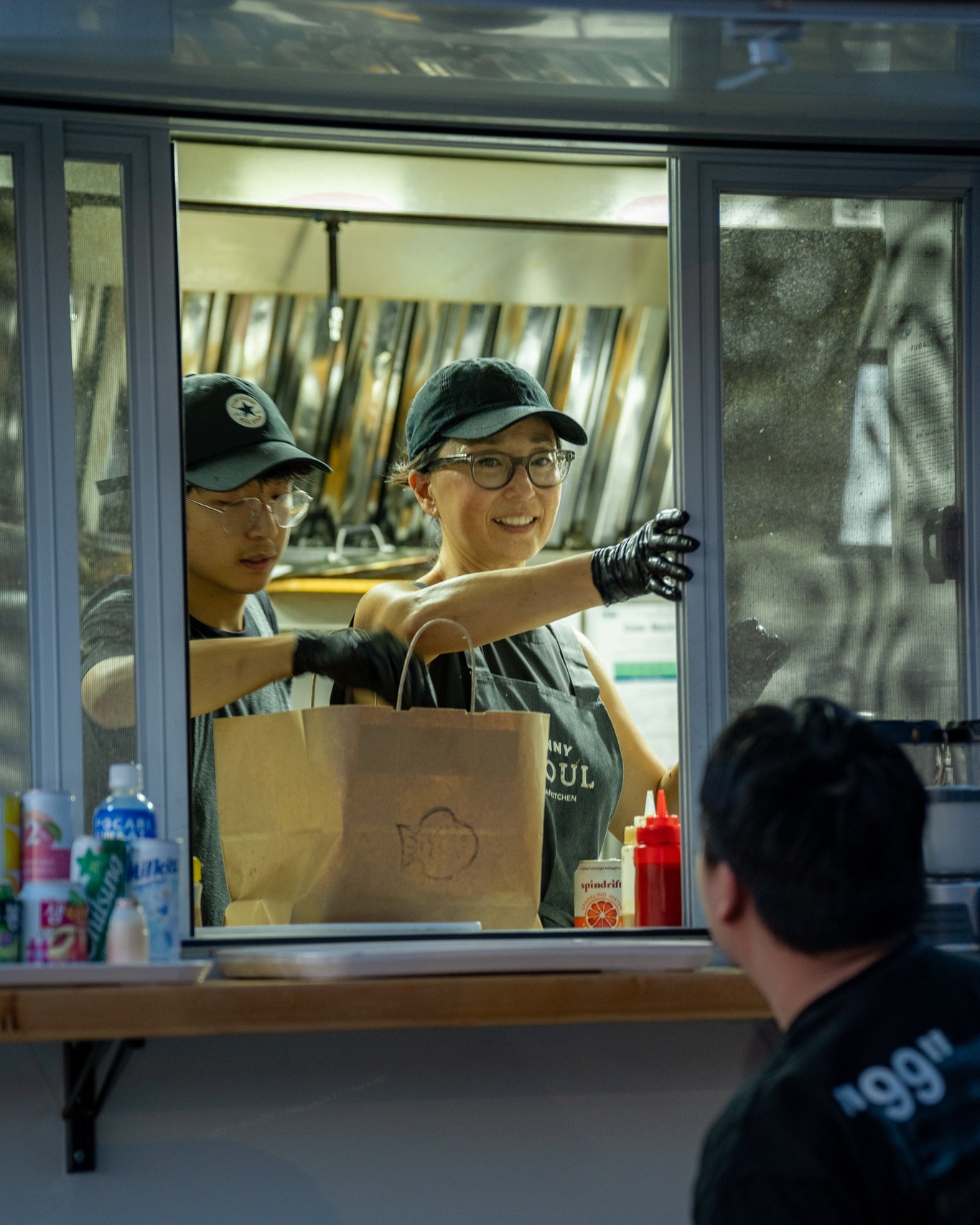 Sunny Seoul food truck serving customers